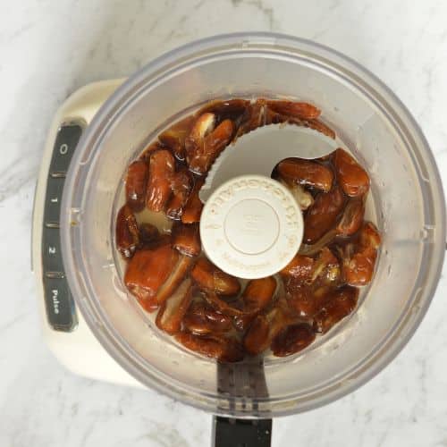 Dates soaking in a food processor.