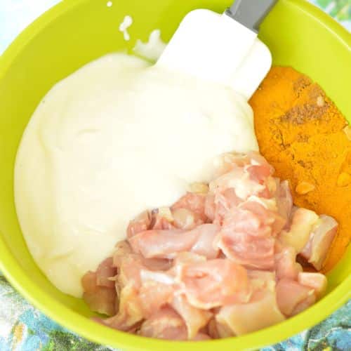 Keto Chicken Curry ingredients in a bowl.