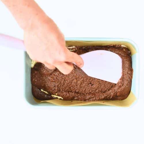 Adding the top chocolate layer on the Keto Chocolate Pound Cake.