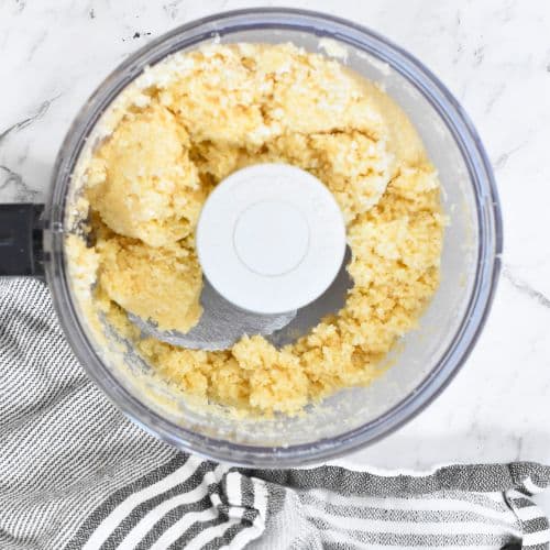 Keto Coconut Cookie batter in a food processor.