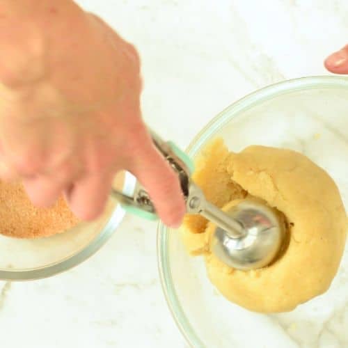 Scooping Keto Snickerdoodle Cookie dough.