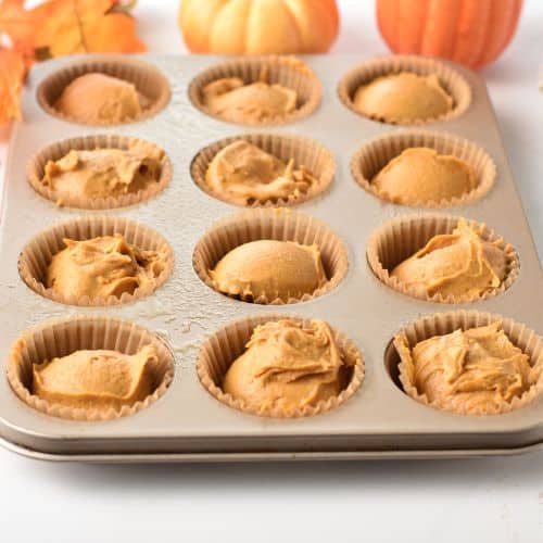 Protein Pumpkin Muffins ready to bake in a muffin pan.